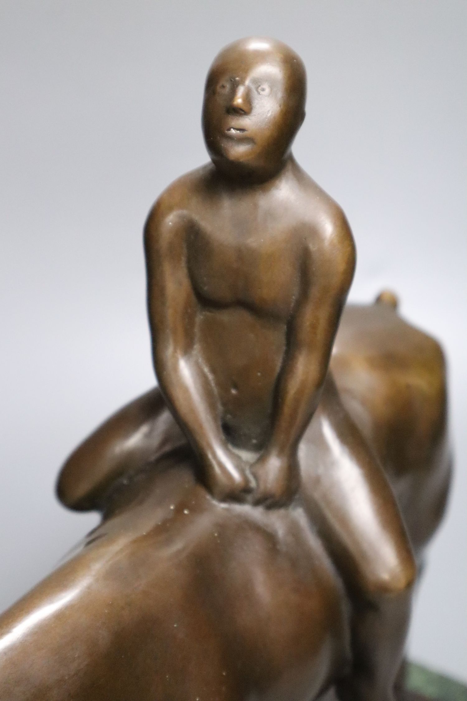 A bronze of a nude man on horseback, signed F. Preiss, height 37cm